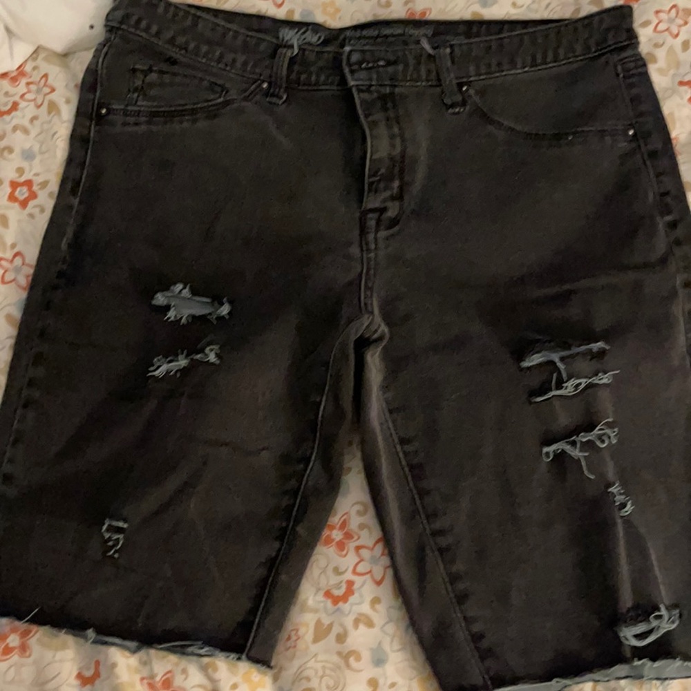Black denim cut-off shorts.